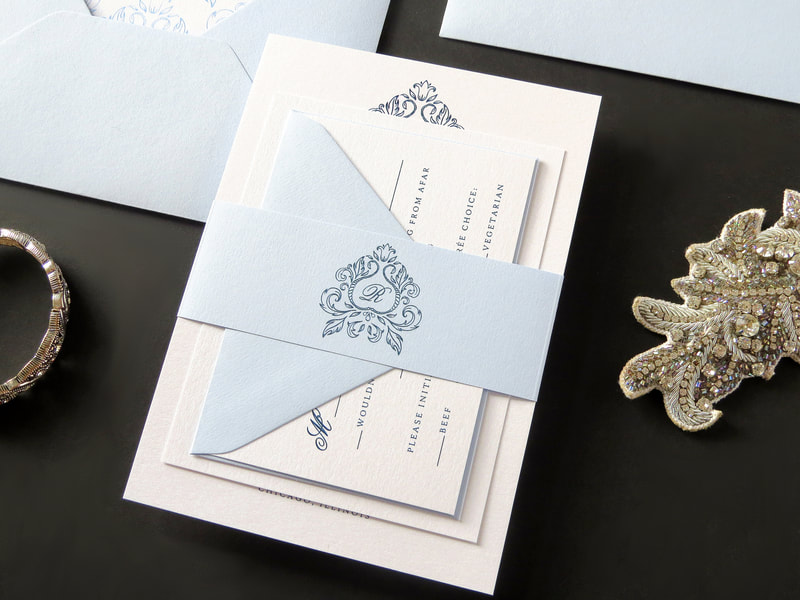 elegant and formal ornate monogram crest wedding invitation in white, pale / serenity blue and ice silver - chicago wedding invitations