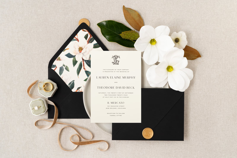 Elegant & Formal Wedding Invitation with Antique Monogram Crest, Magnolia Floral Envelope Liner, and Wax Seal - Inner and Outer Envelope - Black and Ivory