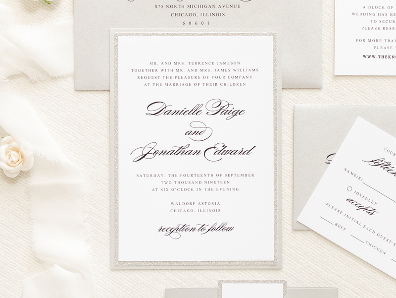 elegant and formal silver glitter, silver metallic shimmer, and white wedding invitation with belly band monogram square