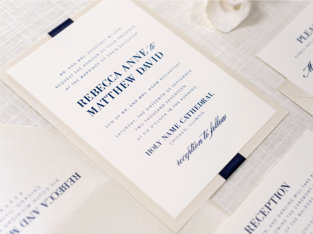 ELEGANT AND FORMAL OPAL CHAMPAGNE SHIMMER, IVORY, AND NAVY BLUE RIBBON ELEGANT WEDDING INVITATION