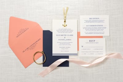 Elegant and Formal Nautical Sliding Pocket Wedding Invitation with Anchor Charm Ribbon Embellishment in Ivory, Navy Blue, Coral, and Antique Gold - Chicago Wedding Invitations