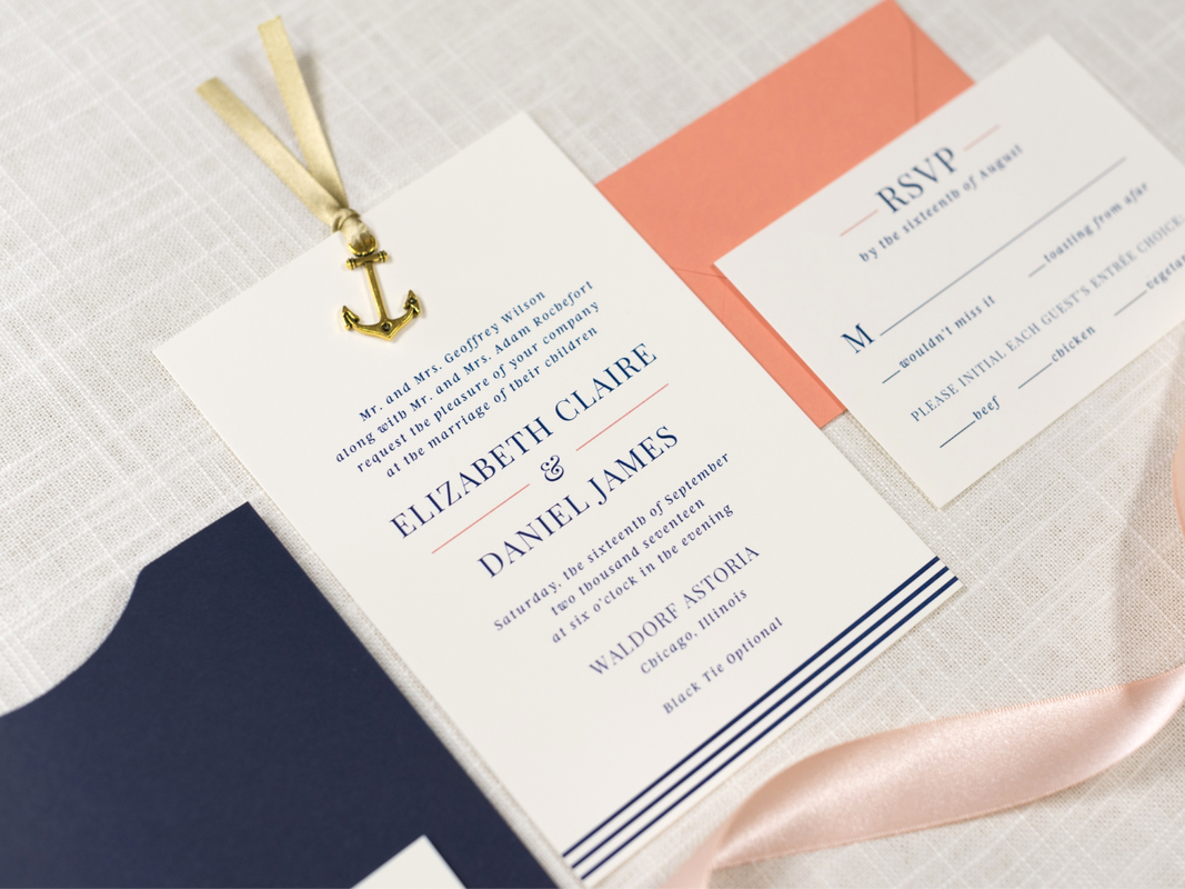 ELEGANT AND FORMAL NAUTICAL SLIDING POCKET WEDDING INVITATION WITH ANCHOR CHARM RIBBON EMBELLISHMENT IN IVORY, NAVY BLUE, CORAL, AND ANTIQUE GOLD