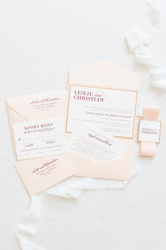 elegant and formal ivory, rose gold glitter, and blush metallic shimmer pocketfold wedding invitation suite with satin ribbon belly band and monogram square