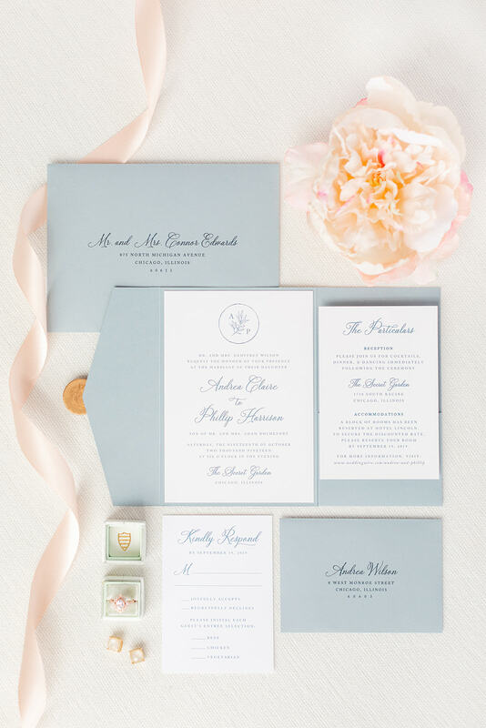 elegant & formal wedding invitation with wax seal and pocketfold in white, dusty blue, french blue, and floral foliage monogram crest