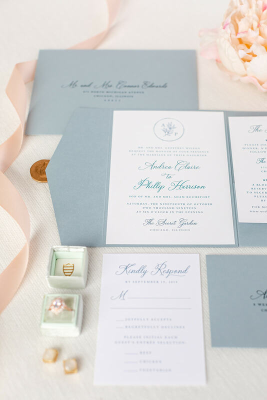 elegant & formal wedding invitation with wax seal and pocketfold in white, dusty blue, french blue, and floral foliage monogram crest