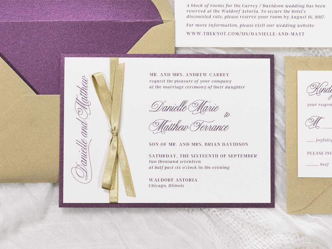 ELEGANT AND FORMAL WEDDING INVITATION IN GOLD SHIMMER, MERLOT, IVORY WITH A GOLD RIBBON BOW EMBELLISHMENT AND ENVELOPE LINER