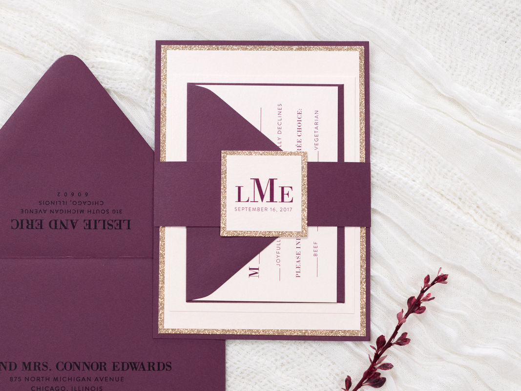 Elegant and Formal Layered Wedding Invitation with Rose Gold Glitter Cardstock, Blush Shimmer, and Burgundy Maroon Embellished with a Belly Band and Glitter Monogram Square