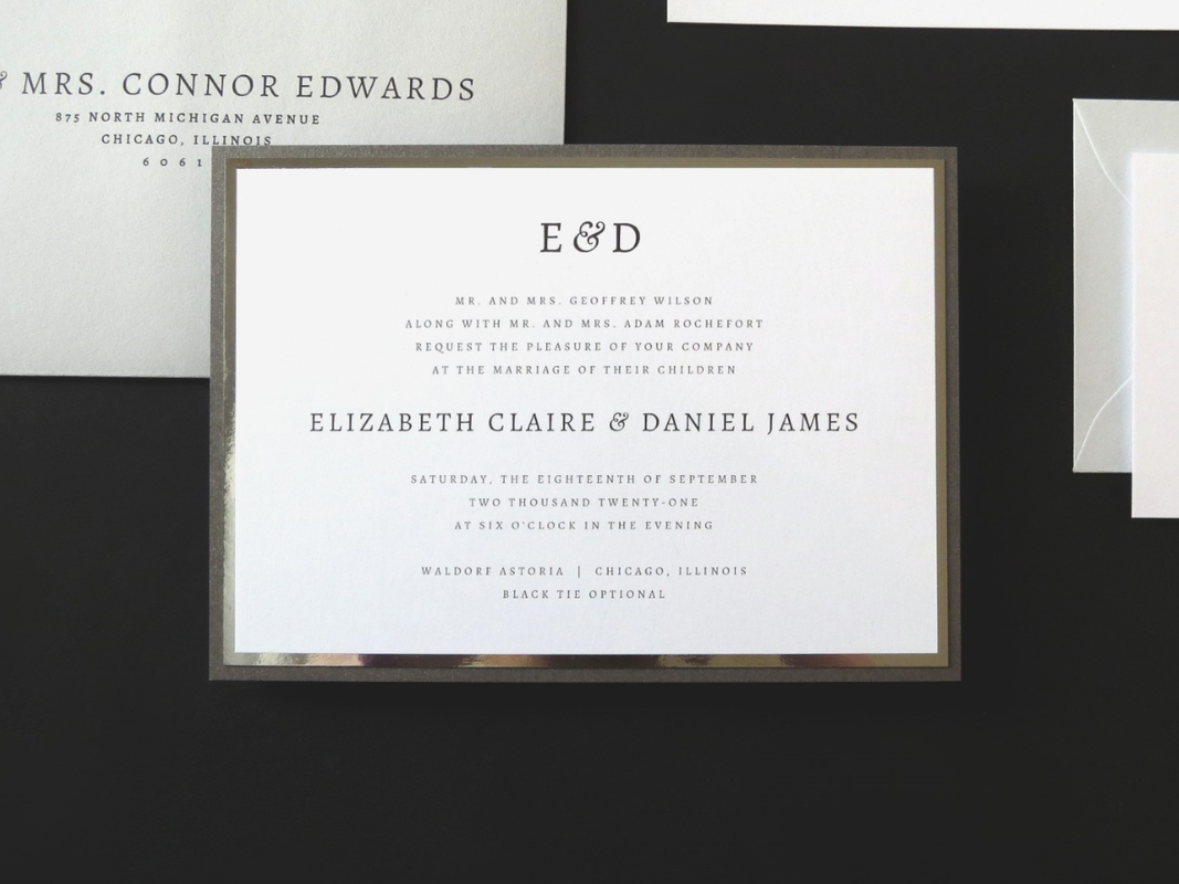 MODERN AND FORMAL LAYERED WHITE, SILVER FOIL, COOL GREY AND DARK GREY SHIMMER WEDDING INVITATION WITH ELEGANT MODERN MONOGRAM