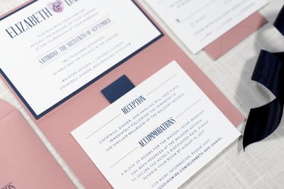 elegant, modern, and formal layered folding wedding invitation with thumbprint heart monogram design in white, dusty rose, and navy blue with belly band - chicago wedding invitations