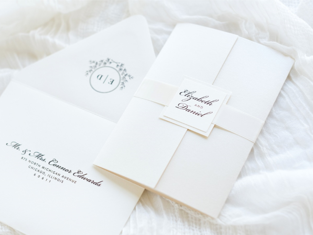 Elegant and Formal Gatefold Wedding Invitation with Ribbon Belly Band and Wedding Crest Monogram Square Embellishment - Ivory, Opal Champagne Shimmer, and Ivory Satin Ribbon