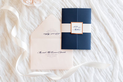 elegant & formal wedding invitation in navy blue, blush shimmer, rose gold foil, and ivory with gatefold and belly band