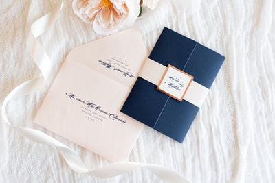 elegant & formal wedding invitation in navy blue, blush shimmer, rose gold foil, and ivory with gatefold and belly band monogram square