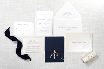 elegant and formal nautical anchor charm and rope pocket fold wedding invitation in navy, ivory, and opal / champagne shimmer - chicago wedding invitations