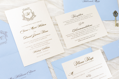 elegant and formal pale, light blue, serenity blue and opal shimmer wedding invitation with botanical laurel formal wedding monogram crest - chicago wedding invitations