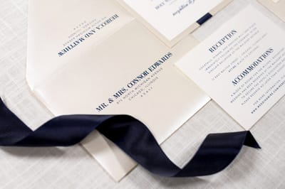 elegant and formal opal / champagne shimmer, ivory, and navy blue ribbon elegant wedding invitation - chicago wedding invitations