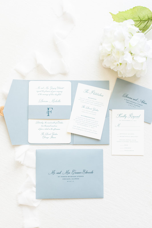 elegant and formal pocketfold wedding invitation with wax seal and belly band in ivory, dusty blue, and gold - botanical, floral, branch, fern monogram crest