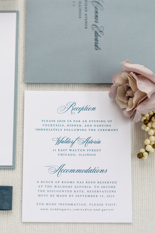 elegant & formal wedding invitation with velvet ribbon belly band band in white, dusty blue, french blue, and vintage ornate filigree monogram crest
