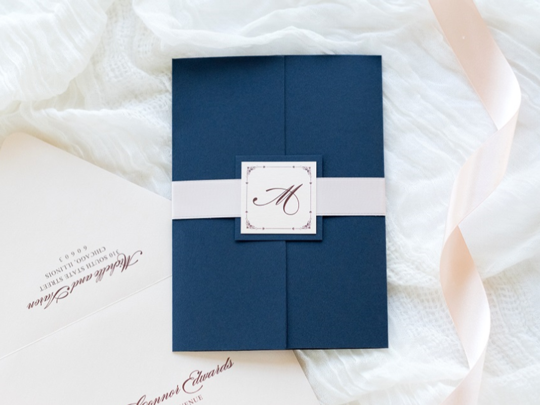 Elegant and Formal Gatefold Wedding Invitation with Ribbon Belly Band and Monogram Square Embellishment - Navy Night Blue, Blush Shimmer, and Blush Satin Ribbon